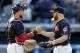Cleveland Indians relief pitcher Cody Allen, right, is congratulated by catcher Yan Gomes after the Indians defeated the Baltimore Orioles 4-2 in a baseball game, Saturday, Sept. 9, 2017, in Cleveland. (AP Photo/Tony Dejak)
