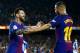 FC Barcelona's Lionel Messi, left, celebrates with his teammate Jordi Alba after scoring during the Spanish La Liga soccer match between FC Barcelona and Espanyol at the Camp Nou stadium in Barcelona, Spain, Saturday, Sept. 9, 2017. (AP Photo/Manu Fernandez)