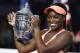 Sloane Stephens, of the United States, holds up the championship trophy after beating Madison Keys, of the United States, in the women's singles final of the U.S. Open tennis tournament, Saturday, Sept. 9, 2017, in New York. (AP Photo/Adam Hunger)