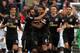 SWANSEA, WALES - SEPTEMBER 10: Jamaal Lascelles of Newcastle United (C) celebrates his goal with team mates during the Premier League match between Swansea City and Newcastle United at The Liberty Stadium on September 10, 2017 in Swansea, Wales. (Photo by Athena Pictures/Getty Images)