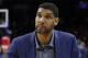 FILE - In this Dec. 7, 2015, file photo, San Antonio Spurs' Tim Duncan watches the second half of an NBA basketball game against the Philadelphia 76ers, in Philadelphia. Duncan announced his retirement on Monday, July 11, 2016, after 19 seasons, five championships, two MVP awards and 15 All-Star appearances. It marks the end of an era for the Spurs and the NBA. (AP Photo/Chris Szagola, FIle)