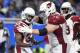 Arizona Cardinals running back Kerwynn Williams (33) reacts with Evan Boehm (70) after scoring a 3-yard touchdown against the Detroit Lions during the second half of an NFL football game in Detroit, Sunday, Sept. 10, 2017. (AP Photo/Jose Juarez)