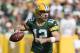 Sep 10, 2017; Green Bay, WI, USA; Green Bay Packers quarterback Aaron Rodgers (12) throws a pass during the first quarter against the Seattle Seahawks at Lambeau Field. Mandatory Credit: Jeff Hanisch-USA TODAY Sports