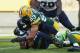 GREEN BAY, WI - SEPTEMBER 10: Nick Perry #53 of the Green Bay Packers sacks Russell Wilson #3 of the Seattle Seahawks during the second half at Lambeau Field on September 10, 2017 in Green Bay, Wisconsin. (Photo by Dylan Buell/Getty Images)