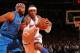 NEW YORK, NY - NOVEMBER 9: Carmelo Anthony #7 of the New York Knicks drives to the basket against Vince Carter #25 of the Dallas Mavericks during the game on November 9, 2012 at Madison Square Garden in New York City. NOTE TO USER: User expressly acknowledges and agrees that, by downloading and or using this photograph, User is consenting to the terms and conditions of the Getty Images License Agreement. Mandatory Copyright Notice: Copyright 2012 NBAE (Photo by Nathaniel S. Butler/NBAE via Getty Images)