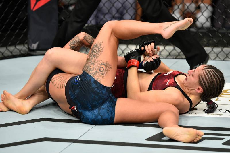EDMONTON, AB - SEPTEMBER 09: (R-L) Sarah Moras of Canada attempts to submit Ashlee Evans-Smith in their women's bantamweight bout during the UFC 215 event inside the Rogers Place on September 9, 2017 in Edmonton, Alberta, Canada. (Photo by Jeff Bottari/Zuffa LLC/Zuffa LLC via Getty Images)