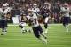 New England Patriots running back D.J. Foster (27) runs for a touchdown during the second half of an NFL football preseason game against the Houston Texans on Saturday, Aug. 19, 2017, in Houston. (AP Photo/Eric Christian Smith)