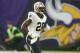 New Orleans Saints running back Adrian Peterson runs onto the field during the first half of an NFL football game against the Minnesota Vikings, Monday, Sept. 11, 2017, in Minneapolis. (AP Photo/Jim Mone)