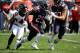 CHICAGO, IL - SEPTEMBER 10: Tarik Cohen #29 of the Chicago Bears carries the football ahead of Duke Riley #42 of the Atlanta Falcons in the second quarter at Soldier Field on September 10, 2017 in Chicago, Illinois. (Photo by Jonathan Daniel/Getty Images)
