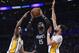 LOS ANGELES, CA - APRIL 9: Shabazz Muhammad #15 of the Minnesota Timberwolves shoots a basket in between Corey Brewer #3 and Tyler Ennis #11 of the Los Angeles Lakers during the first half of the basketball game at Staples Center April 9, 2017, in Los Angeles, California. NOTE TO USER: User expressly acknowledges and agrees that, by downloading and or using this photograph, User is consenting to the terms and conditions of the Getty Images License Agreement. (Photo by Kevork Djansezian/Getty Images)