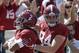 CORRRECTS THAT ALABAMA QUARTERBACK JALEN HURTS IS AT LEFT, NOT RIGHT - Alabama tight end Hale Hentges (84) celebrates with Alabama quarterback Jalen Hurts (2), left, after Hurts scored a touchdown in the first half of an NCAA college football game, Saturday, Sept. 9, 2017, in Tuscaloosa, Ala. (AP Photo/Brynn Anderson)
