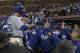Los Angeles Dodgers' Chase Utley (26) is congratulated after hitting a solo home run against the San Francisco Giants during the fourth inning of a baseball game in San Francisco, Tuesday, Sept. 12, 2017. (AP Photo/Jeff Chiu)