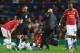 MANCHESTER, ENGLAND - SEPTEMBER 12: Paul Pogba of Manchester United receives treatment from the medical team during the UEFA Champions League Group A match between Manchester United and FC Basel at Old Trafford on September 12, 2017 in Manchester, United Kingdom. (Photo by Laurence Griffiths/Getty Images)
