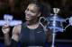 FILE - In this Jan. 28, 2017, file photo, Serena Williams holds up a finger and her trophy after defeating her sister, Venus, in the women's singles final at the Australian Open tennis championships in Melbourne, Australia. Williams wants to help diversify the tech industry now that she is joining a Silicon Valley boardroom for the first time. Online poll taking service SurveyMonkey announced Williams’ appointment to its board on Wednesday, May 24, along with Intuit CEO Brad Smith. (AP Photo/Aaron Favila, File)