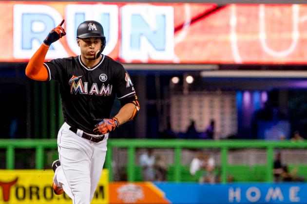 MIAMI, FL - SEPTEMBER 02: Giancarlo Stanton #27 of the Miami Marlins hits a home run during the first inning of the game against the Philadelphia Phillies at Marlins Park on September 2, 2017 in Miami, Florida. (Photo by Rob Foldy/Miami Marlins via Getty Images)