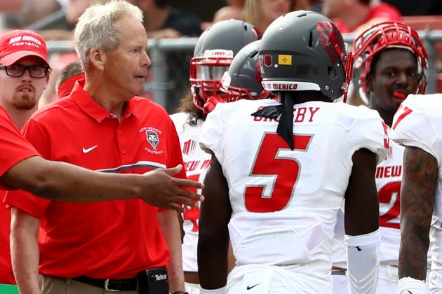 PISCATAWAY, NJ - SEPTEMBER 17:  Lee Crosby #5 of the New Mexico Lobos walks past head coach Bob Davie after Crosby was called for unsportsmanlike conduct against the Rutgers Scarlet Knights at High Point Solutions Stadium on September 17, 2016 in Piscataway, New Jersey.The Rutgers Scarlet Knights defeated the New Mexico Lobos 37-28.  (Photo by Elsa/Getty Images)