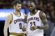 Cleveland Cavaliers' LeBron James (23) talks with Kevin Love (0) against the Boston Celtics during the second half of Game 3 of the NBA basketball Eastern Conference finals, Sunday, May 21, 2017, in Cleveland. The Celtics won 111-108. (AP Photo/Tony Dejak)