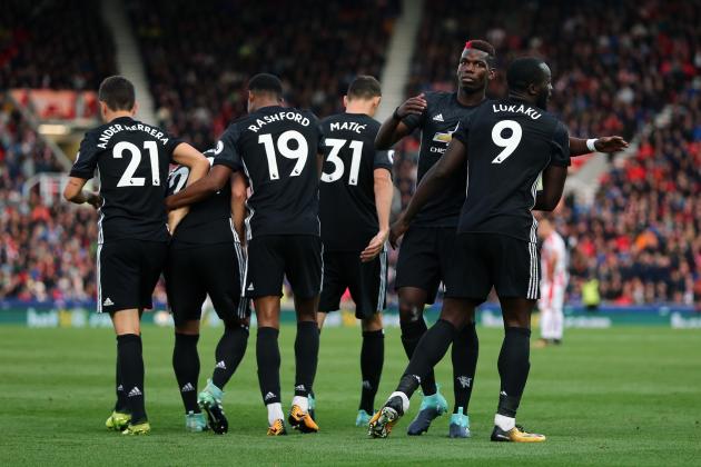 STOKE ON TRENT, ENGLAND - SEPTEMBER 09: Romelu Lukaku of Manchester United celebrates with his team mates after scoring a goal to make it 1-2 during the Premier League match between Stoke City and Manchester United at Bet365 Stadium on September 9, 2017 in Stoke on Trent, England. (Photo by James Baylis - AMA/Getty Images)