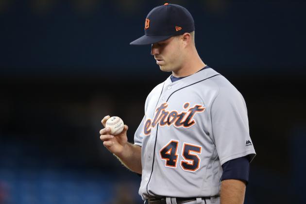 TORONTO, ON - SEPTEMBER 8: Buck Farmer #45 of the Detroit Tigers examines the baseball during MLB game action against the Toronto Blue Jays at Rogers Centre on September 8, 2017 in Toronto, Canada. (Photo by Tom Szczerbowski/Getty Images)