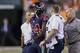 Houston Texans cornerback Johnathan Joseph (24) is helped off the field after an apparent injury during the first half of an NFL football game against the Cincinnati Bengals, Thursday, Sept. 14, 2017, in Cincinnati. (AP Photo/Gary Landers)