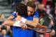 France's Nicolas Mahut celebrates with Pierre-Hugues Herbert (back) after winning their Davis Cup semi-final tennis match against Serbia at the Pierre Mauroy Stadium in Lille, northern France, on September 16, 2017. / AFP PHOTO / DENIS CHARLET (Photo credit should read DENIS CHARLET/AFP/Getty Images)
