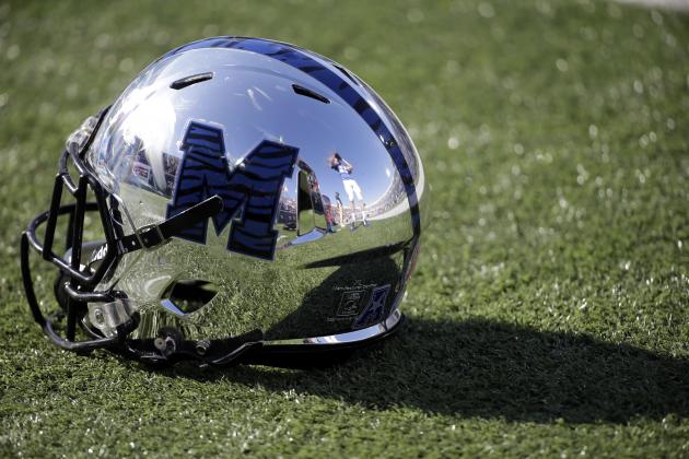A Memphis football helmet sits on the turf before the start of an NCAA college football game between Memphis and Mississippi Saturday, Oct. 17, 2015, in Memphis, Tenn. (AP Photo/Mark Humphrey)