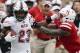 Northern Illinois running back Jordan Huff (23) is pushed out of bounds by Nebraska linebacker Mohamed Barry, right, during the first half of an NCAA college football game in Lincoln, Neb., Saturday, Sept. 16, 2017. (AP Photo/Nati Harnik)