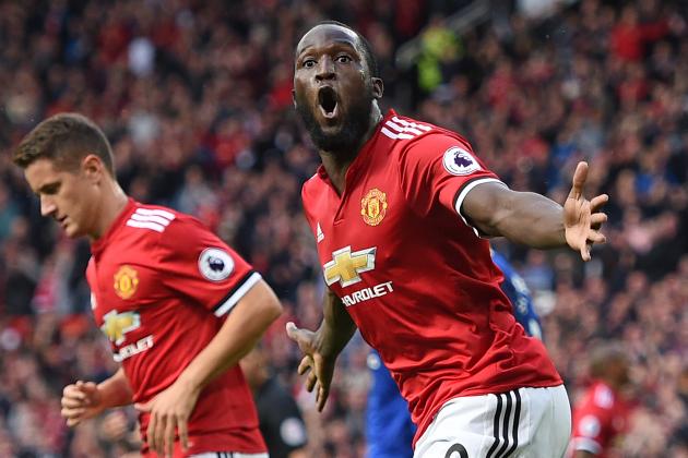 Manchester United's Belgian striker Romelu Lukaku (R) celebrates after scoring their third goal during the English Premier League football match between Manchester United and Everton at Old Trafford in Manchester, north west England, on September 17, 2017. / AFP PHOTO / Oli SCARFF / RESTRICTED TO EDITORIAL USE. No use with unauthorized audio, video, data, fixture lists, club/league logos or 'live' services. Online in-match use limited to 75 images, no video emulation. No use in betting, games or single club/league/player publications.  /         (Photo credit should read OLI SCARFF/AFP/Getty Images)