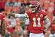 Kansas City Chiefs quarterback Alex Smith (11) point before an NFL football game against the Philadelphia Eagles in Kansas City, Mo., Sunday, Sept. 17, 2017. (AP Photo/Ed Zurga)