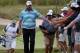 LAKE FOREST, IL - SEPTEMBER 17: Marc Leishman of Australia greets fans as he walks to the fourth tee during the final round of the BMW Championship at Conway Farms Golf Club on September 17, 2017 in Lake Forest, Illinois. (Photo by Gregory Shamus/Getty Images)