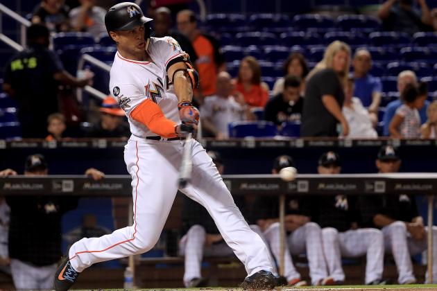 MIAMI, FL - SEPTEMBER 05:  Giancarlo Stanton #27 of the Miami Marlins hits during a game against the Washington Nationals at Marlins Park on September 5, 2017 in Miami, Florida.  (Photo by Mike Ehrmann/Getty Images)