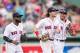 BOSTON, MA - SEPTEMBER 14: CJackie Bradley Jr. #19, Andrew Benintendi #16, and Mookie Betts #50 of the Boston Red Sox celebrate a victory against the Oakland Athletics on September 14, 2017 at Fenway Park in Boston, Massachusetts. (Photo by Billie Weiss/Boston Red Sox/Getty Images)