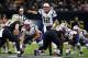 New England Patriots quarterback Tom Brady (12) calls an audible from the line of scrimmage in the second half of an NFL football game against the New Orleans Saints in New Orleans, Sunday, Sept. 17, 2017. (AP Photo/Butch Dill)