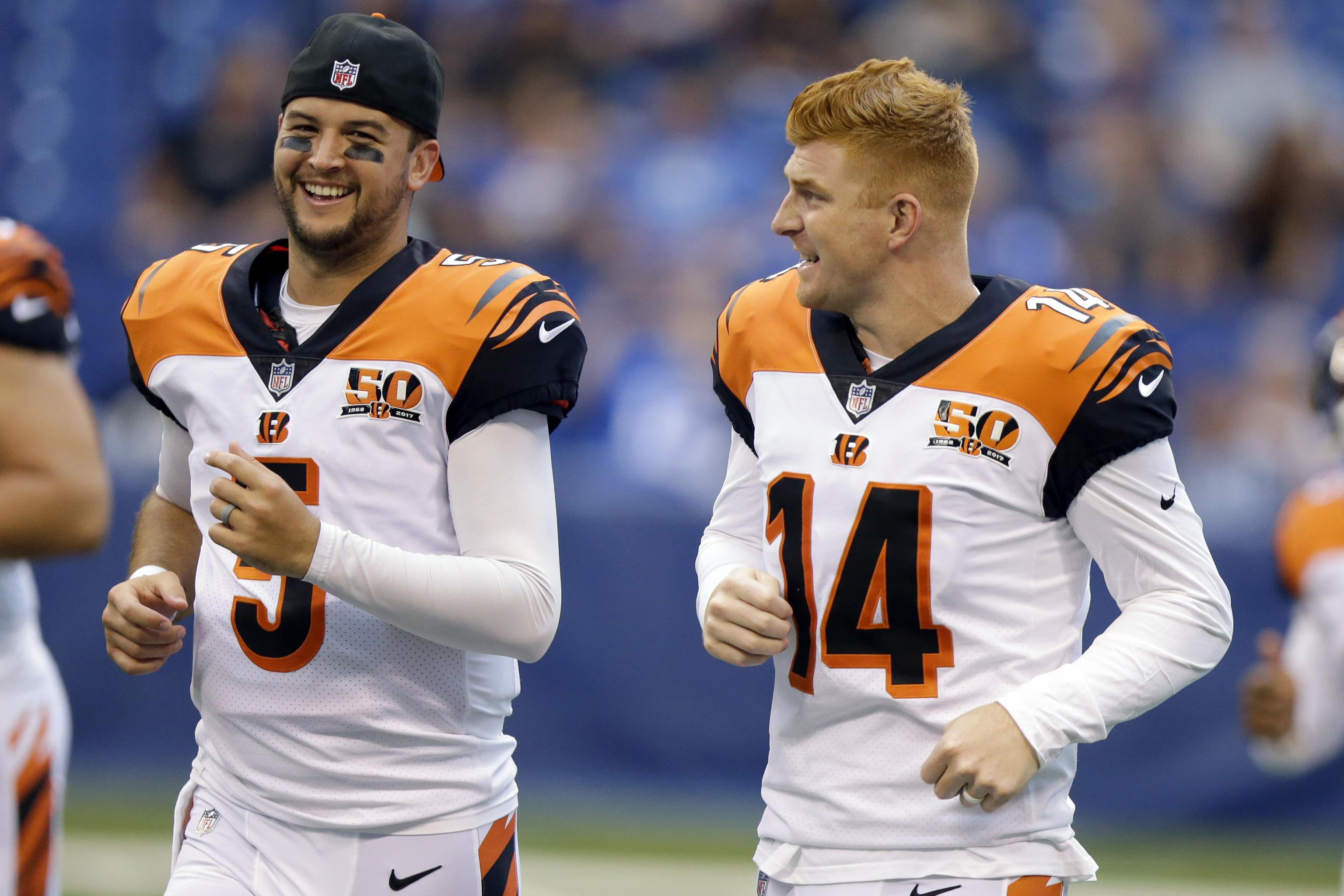 First-time father AJ McCarron gets diaper-changing advice from Andy Dalton