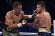 LAS VEGAS, NV - SEPTEMBER 16: Gennady Golovkin punches Canelo Alvarez during their WBC, WBA and IBF middleweight championship bout at T-Mobile Arena on September 16, 2017 in Las Vegas, Nevada. (Photo by Al Bello/Getty Images)