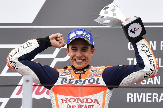 Repsol Honda Team's Marc Marquez from Spain celebrates on the podium at the end of the San Marino Moto GP Grand Prix race at the Marco Simoncelli Circuit in Misano on September 10, 2017. / AFP PHOTO / Marco BERTORELLO        (Photo credit should read MARCO BERTORELLO/AFP/Getty Images)