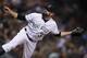 Colorado Rockies reliever Pat Neshek watches a pitch to Arizona Diamondbacks' J.D. Martinez during the seventh inning of a baseball game Saturday, Sept. 2, 2017, in Denver. The Diamondbacks won 6-2. (AP Photo/David Zalubowski)