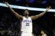 FILE - In this Jan. 27, 2017, file photo, Philadelphia 76ers' Joel Embiid reacts during an NBA basketball game against the Houston Rockets in Philadelphia. Embiid's numbers are the best in the rookie class. Yet his rookie of the year chances seem very flawed for this reason: Embiid will miss nearly two-thirds of Philadelphia's season because of injuries. (AP Photo/Matt Slocum, File)