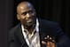 Former NFL football player Ricky Williams, who played for the New Orleans Saints and the Miami Dolphins among other teams, addresses an audience during a conference on medical marijuana at Harvard Medical School, Tuesday, April 11, 2017, in Boston. (AP Photo/Steven Senne)