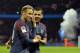 PARIS, FRANCE - SEPTEMBER 17: Neymar Jr and Dani Alves of Paris Saint-Germain react after Kylian Mbappe scored during the Ligue 1 match between Paris Saint Germain and Olympique Lyonnais at Parc des Princes on September 17, 2017 in Paris, . (Photo by Aurelien Meunier/Getty Images)