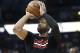 Chicago Bulls guard Dwyane Wade (3) warms up before an NBA basketball game against the Atlanta Hawks Friday, Jan. 20, 2017, in Atlanta. (AP Photo/John Bazemore)