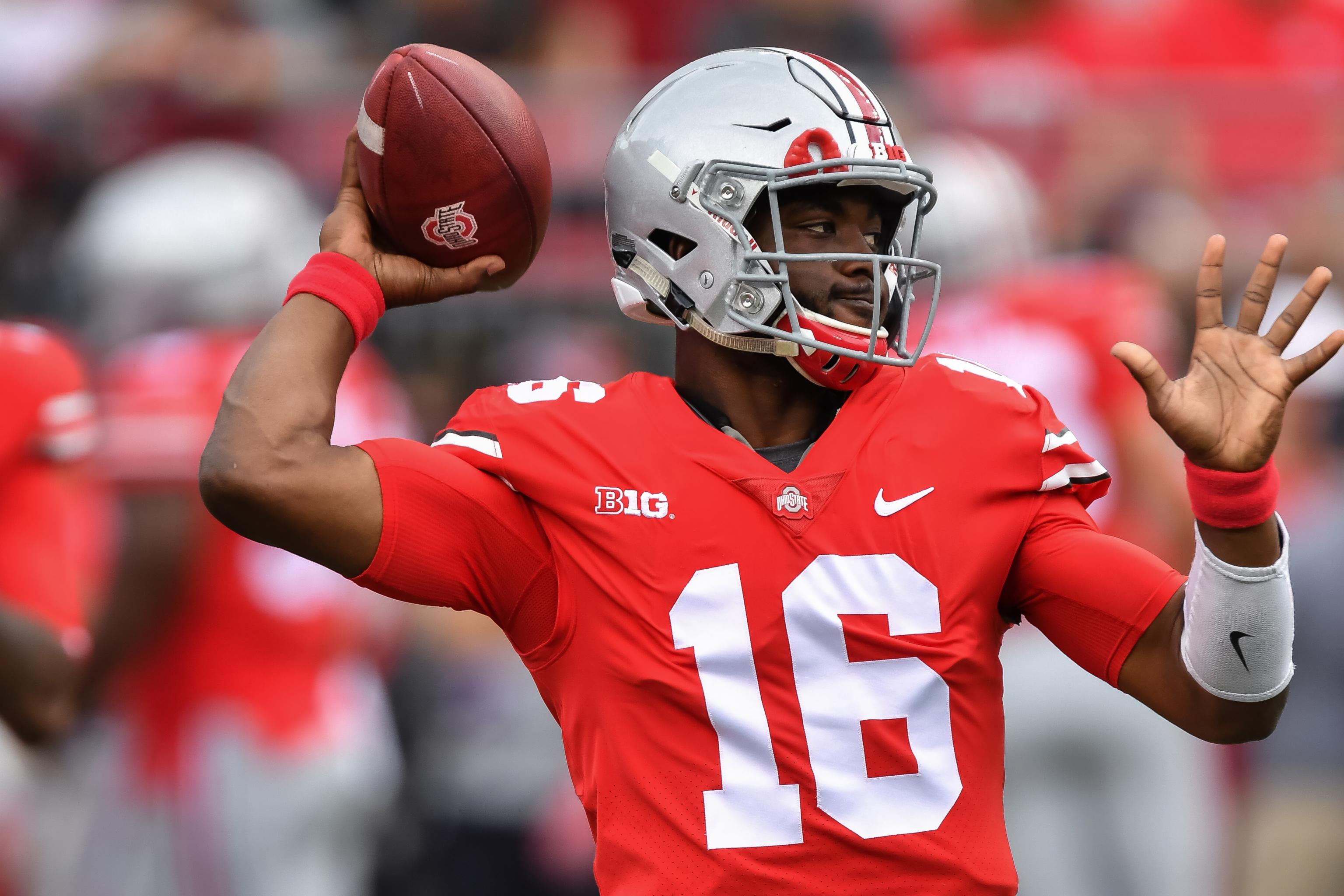 J.T. Barrett injury: Ohio State QB suffers right ankle fracture, carted off  against Michigan - Sports Illustrated