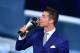 TOPSHOT - Real Madrid and Portugal's forward Cristiano Ronaldo kisses his trophy after winning the The Best FIFA Mens Player of 2016 Award next to FIFA president Gianni Infantino during The Best FIFA Football Awards ceremony, on January 9, 2017 in Zurich. / AFP / Fabrice COFFRINI (Photo credit should read FABRICE COFFRINI/AFP/Getty Images)
