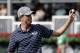 Webb Simpson waves to the crowd after finishing on the 18th hole during the first round of the Tour Championship golf tournament at East Lake Golf Club in Atlanta, Thursday, Sept. 21, 2017. (AP Photo/David Goldman)