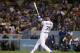 LOS ANGELES, CA - SEPTEMBER 22: Cody Bellinger #35 of the Los Angeles Dodgers watches the ball leave the ball park for his three-run home run, his 39th of the season to break the National League rookie home run record, during the third inning of the MLB game against the San Francisco Giants at Dodger Stadium on September 22, 2017 in Los Angeles, California. (Photo by Victor Decolongon/Getty Images)