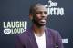 NBA basketball player Chris Paul poses at Kevin Hart's