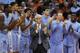 FILE - In this Jan. 9, 2016, file photo, North Carolina head coach Roy Williams claps with players on the bench during the second half of an NCAA college basketball game against Syracuse in Syracuse, N.Y. No. 2 North Carolina is the only unbeaten team in the Atlantic Coast Conference after a favorable opening month of the league schedule. The Tar Heels on Saturday play Boston College, which is 0-7 in the league. Then things get tougher. (AP Photo/Nick Lisi, File)
