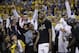 Golden State Warriors forward Kevin Durant, center, celebrates with his mother Wanda Durant as he is named the NBA Finals Most Valuable Player after Game 5 of basketball's NBA Finals between the Warriors and the Cleveland Cavaliers in Oakland, Calif., Monday, June 12, 2017. The Warriors won 129-120 to win the NBA championship. (AP Photo/Marcio Jose Sanchez)