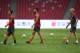 Arsenal players Mesut Ozil (L), Olivier Giroud (C) and coach Arsene Wenger take part in a football training session in Beijing's National Stadium, known as the Bird's Nest, on July 21, 2017.
Arsenal will play Chelsea at the Bird's Nest on July 22. / AFP PHOTO / GREG BAKER (Photo credit should read GREG BAKER/AFP/Getty Images)