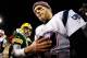 GREEN BAY, WI - NOVEMBER 30: Quarterback Tom Brady #12 of the New England Patriots walks away from Aaron Rodgers #12 of the Green Bay Packers after shaking hands following the NFL game at Lambeau Field on November 30, 2014 in Green Bay, Wisconsin. The Packers defeated the Patriots 26-21. (Photo by Christian Petersen/Getty Images)